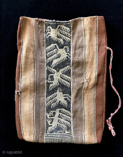 Jalq'a bag in natural, un-dyed alpaca fiber. Bolivia, early 20th century. Weavings of the indigenous Jalq'a people from the Potolo region almost always have very strong synthetic reds, pinks and black dyes  ...