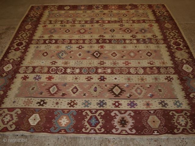 Sharkoy kilim, Western Turkey.

Size: 8ft 0in x 7ft 3in (244 x 220cm).

Old Sharkoy kilim, Western Turkey

Circa 1920

Sharkoy kilims are also known as Sarkoy or Thracian, they originate from Western Turkey or the  ...