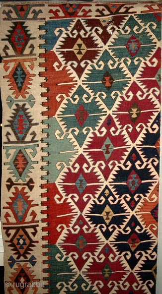 From Sonny Berntssons collection:
No 160 Sivrihisar kilim (half) 71 x 410 cm  circa 1850
Some holes as can be seen on photo.
More innfo if you ask.
NOTE: E-mails are not always delivered to  ...