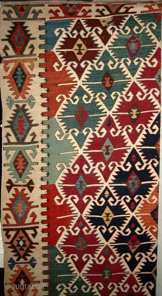 From Sonny Berntssons collection:
No 160 Sivrihisar kilim (half) 71 x 410 cm  circa 1850
Some holes as can be seen on photo.
More innfo if you ask.
NOTE: E-mails are not always delivered to  ...