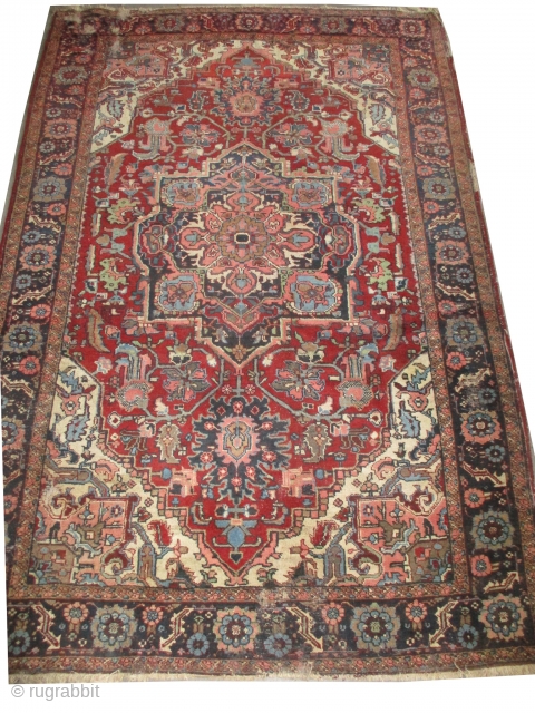 

Heriz Persian, knotted circa 1920 antique, 287 x 190 cm, carpet ID: P-5001
The black knots are oxidized, the knots are hand spun wool, the center medallion and the border are indigo, rust  ...