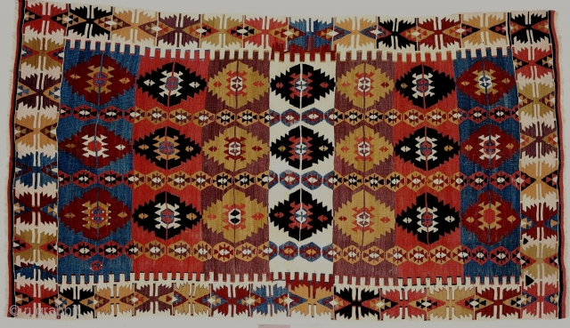 An outstanding central Anatolian single-width kilim, first-half 19c, with lovely purple and light blue dyes.                  