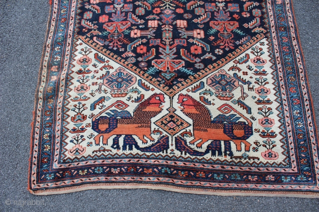 Kurdish Dragon battling Lion rug, ca 1920. Rare imagery of a Dragon biting a Lion on the back of the neck. Wool on wool. Colors appear natural. One very small corner repair  ...