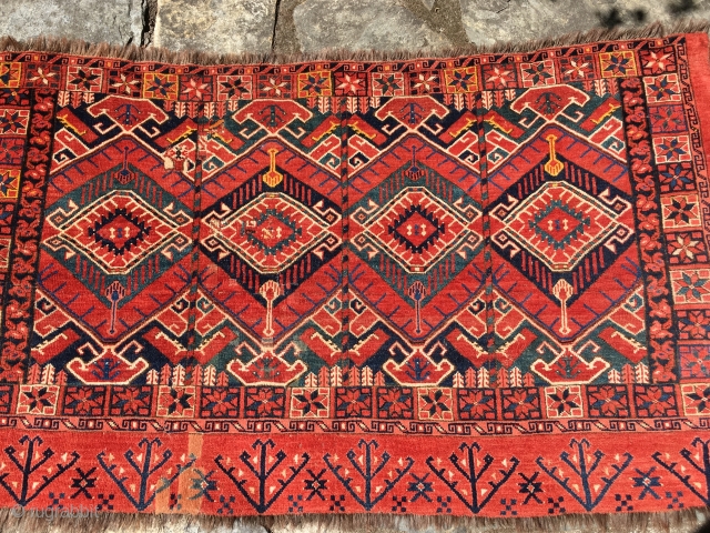 Rare, large and colorful Ersari Chuval circa 1875. Outstanding Ikat design. All natural colors including reds, three blues, green blue and a brilliant yellow. Measures 5'4" X 3'2" or 163 X 97cm.  ...
