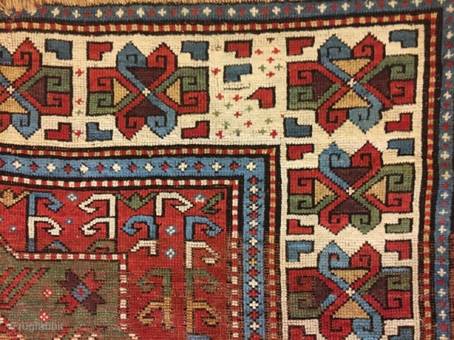 Early kazak rug with damage , 245 x 154 cm                       