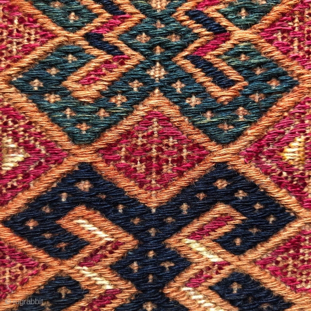 Yomut (?) sumakh torba, mid 19th century. All original and complete with its back, fringes, hanging ropes. Fantastic, early, mellow colours, incl. deep mauve madder, dark indigo, flashing greens, soft peach. With  ...