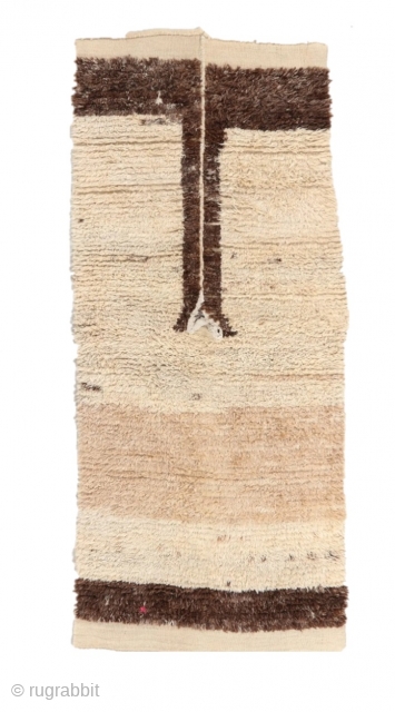 Anatolian Tulu Rug (107x246cm)
The so-called called  Çoban Tüllüsü /Shepherd’s  coat used by shepherds across Anatolia.
This interesting ethnographic artefact has been adapted to be used as a floor covering by stitching  ...