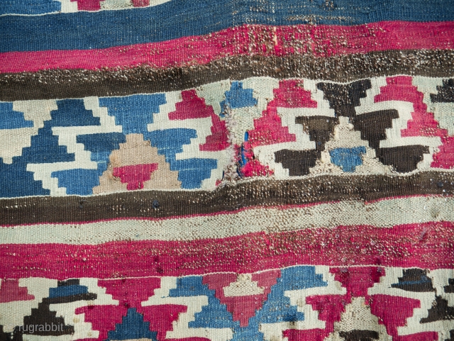 A very old Shirvan kilim. Distressed with one small old repair. Still quite charismatic
Size:  6.6x4.6 feet  
The archaic design of this Shirvan kilim is describes in Yanni Petsopoulos' book Kilims  ...