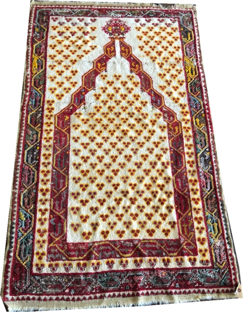 An Interesting Turkish prayer rug  measures 3' x 5'.                       