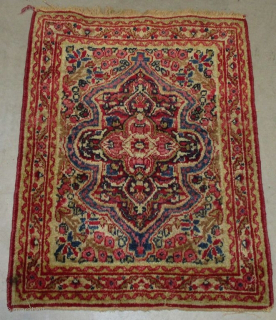 Antique Kerman Rug 1’4” X 1’9” #8094
This circa 1880 Kerman rug measures 1’4” X 1’9”. It has a large medallion in red, coral and ivory with a blue border around it on  ...