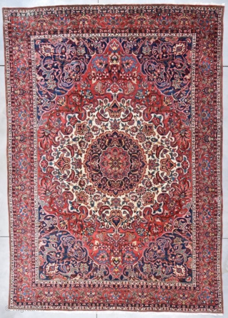 NOT AN ANTIQUE BUT SOMETIMES YOU JUST WANT A GOOD LOOKING SAROUK CARPET FOR THE FLOOR! OVERSIZED at 10'9" X 14'6
https://antiqueorientalrugs.com/product/persian-sarouk-oriental-rug-101-x-146-8100/            