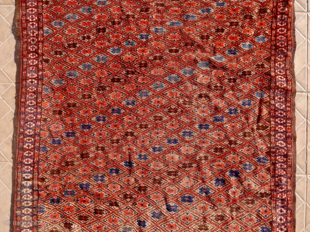 An antique Ersari-Beshir small main carpet, Buchara Oasis, circa 1880, 230 x 120 cm. Unusual design with a lattice of diagonal placed poppy flowers on a purple red ground. Nice sea-green and  ...