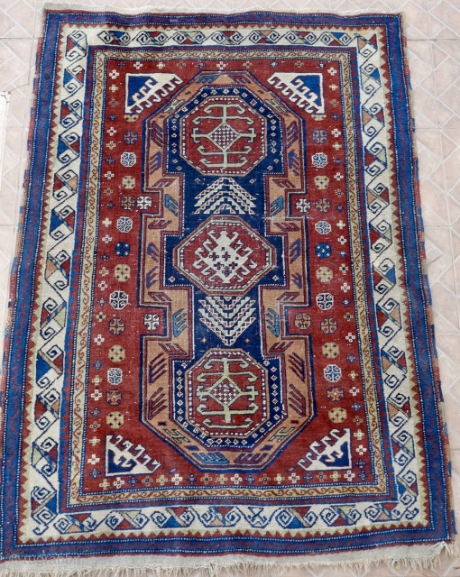 A Baku Surahani Garden rug, 126 x 174 cm. early 20 th. C. The design represents a bird's eye view of a walled garden with central trees, flanked by two octagonal fountains  ...