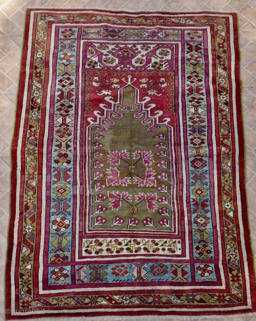 Antique Kirshehir prayer rug 114 x 159 cm. around 1850-60. excellent deep purple and light blue. some central repair.              