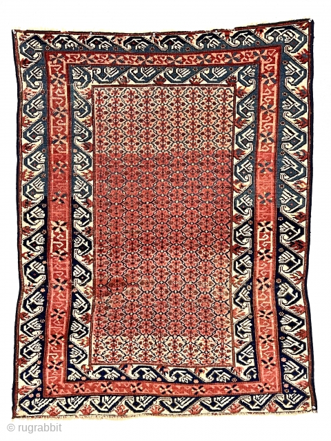 Antique Caucasian kuba or seichour rug. Unusual field design and iconic “running dog” borders. Overall good condition for the age with mostly even low pile. I see what looks like a small  ...