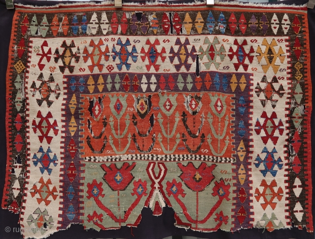 Fabulous, old, big and colorful Inlice (Konya area) tulip kilim fragment (137 cm. x 102 cm.) 
Mounted on a black fabric, clean and ready to display.
Shipping worldwide at cost.
If any question just  ...