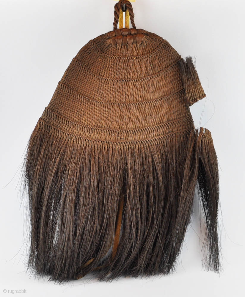 A large Japanese straw hat used by hunters and farmers. Plaited with