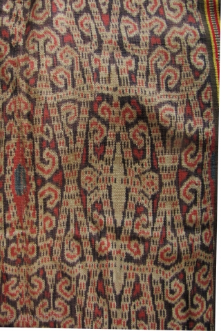 Lovely Iban woman’s skirt from the Kapit region in Sarawak, circa 1940-1950. The broad center field is woven from handspun cotton and natural dyes. The red use in this is particularly rich.  ...