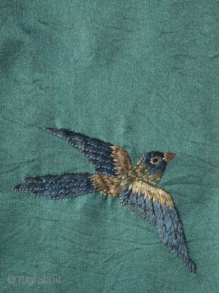 Unusual Chinese "100 birds" silk embroidery dating to late 19th century. The execution is charming and playful in a way we haven't seen on any other examples and the green ground is  ...