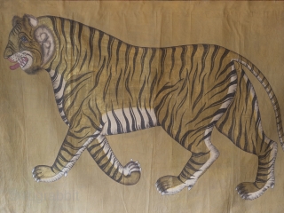 A highly decorative and very rare Indian Tiger painting. Gilt and oil pigments on cotton cloth.  150cm x 106cm (59 x 42 inches)

The painting is part of a tradition going back to  ...
