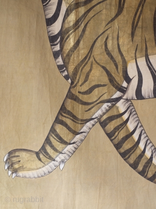 A highly decorative and very rare Indian Tiger painting. Gilt and oil pigments on cotton cloth.  150cm x 106cm (59 x 42 inches)

The painting is part of a tradition going back to  ...