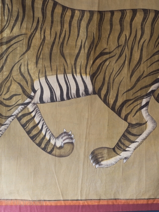 A highly decorative and very rare Indian Tiger painting. Gilt and oil pigments on cotton cloth.  150cm x 106cm (59 x 42 inches)

The painting is part of a tradition going back to  ...