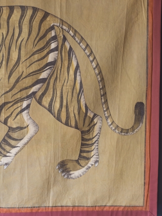 A highly decorative and very rare Indian Tiger painting. Gilt and oil pigments on cotton cloth.  150cm x 106cm (59 x 42 inches)

The painting is part of a tradition going back to  ...