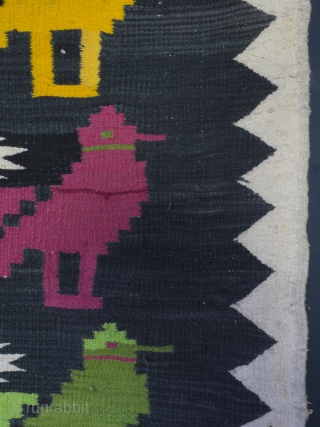 Mid Century Dhurrie rug, 203cm x 104cm (80 inches x 41 inches)

A cheerful and very charming rug from Rajasthan, circa 1950. The central field with rows of brightly woven birds drawn, in  ...