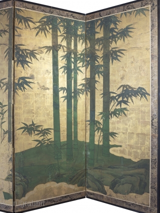 Late 18th Century byobu screen featuring a bold design of a bamboo grove beside a brushwood fence rendered in the moriage relief technique. 168cm x 254cm (66inches x 100 inches). Unknown Kano school painter.

This  ...