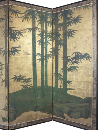 Late 18th Century byobu screen featuring a bold design of a bamboo grove beside a brushwood fence rendered in the moriage relief technique. 168cm x 254cm (66inches x 100 inches). Unknown Kano school painter.

This  ...