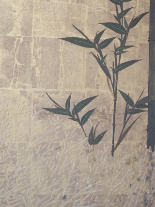 Late 18th Century byobu screen featuring a bold design of a bamboo grove beside a brushwood fence rendered in the moriage relief technique. 168cm x 254cm (66inches x 100 inches). Unknown Kano school painter.

This  ...