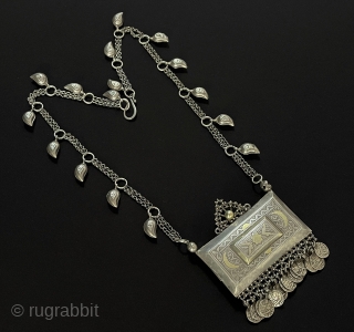 Central - Asian Antique Uzbekistan Tribal Handcarved Silver Necklace & Gold Washed.
Before, when people used it, they used to print a picture of their loved ones or amulets and use it. Circa  ...