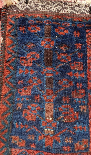 An early Timuri, Baluch prayer rug. Ca. 19th century. A finely woven blue ground prayer of exceedingly rare type.  The wool quality along with very well saturated dyes and elaborately detailed  ...
