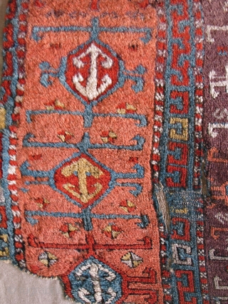 East Anatolian Kurdish Rug, Great Colors, especially the purple ground, Great Wool, blue wefted with traces of brocaded ends at the bottom. Great graphic quality. Very good age, fragmented and mounted. There  ...
