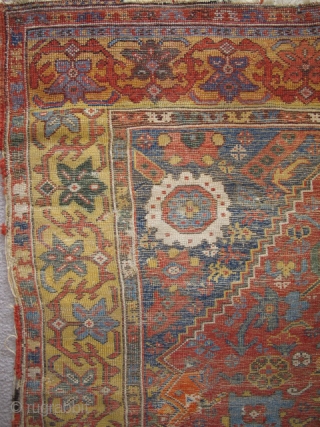 Kula type rug, (or at least it appears so at first glance) Intensely saturated colors including two yellows, at least three blues and four greens. Lots of lazy lines. The border is  ...