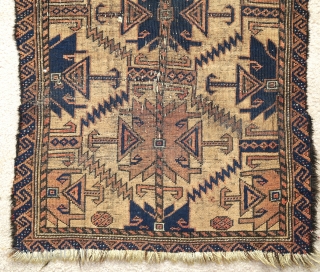 Baluch camel ground prayer rug with large ashik like design, black animal hair weft, tight thick weave, condition is quite messed up but the piece is still quite compelling.    
