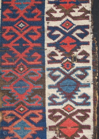 Super Purple Kilim-Design Anatolian Pile Fragment. Old and wonderful with top color. (size is about 4'0"x3'4".) This piece is mounted and conserved against black fabric. (The photo is a bit washed but  ...