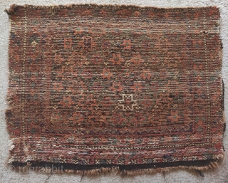Very rustic Baluch bagface. My guess is Sistan. Great soft wool and vibrant color. weft is varied with areas of cotton and camel colored wool. Size = 2'0"x1'7"     