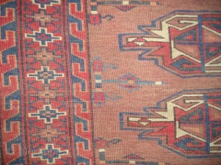 Turkmen chuval. Mostly asymmetrically knotted open left, but with some bands of symmetrical knots in the lower border. Dark wefts, unusual palette. Looks very Yomut but some would call it ''Eagle Group  ...