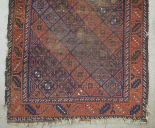 Baluch rug with serrated ashik-like tile design and a leaf border. Several blues, nice color in general. Goat hair side selvedge. 3'6"x6'3"           