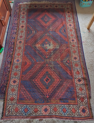 Symmetrically knotted Baluch rug with a Mushwani type diamond design. Some wear and old attempts at restoration. Dynamic and fun with nice natural color. 3'8"x6'10"        