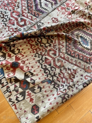 ANTIQUE 19 CENTURY , DOUBLE IVORY FIELD AND BORDER, LOTS OF AUBERGINE PURPLE, OXIDATIONS, ULTRA RARE ANATOLIAN KILIM FIND, ANCIENT RESTORATIONS, SIGNS OF USE, WALL HANGING LOOPS.


Minimalist Design


All Wool


All Organic colors



161 x  ...