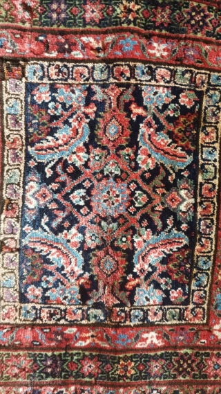 Ferahan bagface, some mothbite, the green ground corroded, as normal for a mid 19th rug, otherwise in clearly collectible condition. Rare to find one of these       