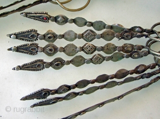 Pashtun Head Ornament, was worn either on the head or as a necklace.
Each of the 14 pieces is 19cm long and is made from metal with a low silver content.Afghan/Pakistan Border Region.  ...