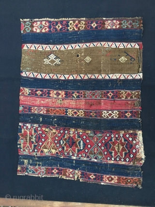 Reshwani/Sinanli kilim fragment. Cm 70x90. Datable 1840/1860. Amazing textile with lots of cochineal, indigo and metal thread. Worn, torn, battered, but still glowing with lots of character, aura, power. Great colors.
  