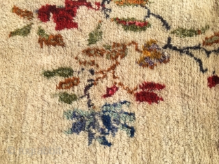 Flower vintage yatak or sleeping rug. Cm 140x240 ca. Datable 1920/1940. Central Anatolia, could be Karapinar. Very high pile. Beige field with blueish border. Condition issues: a couple of small moth holes  ...