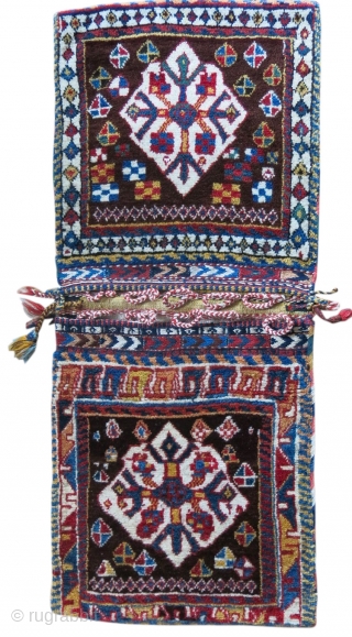 Qashqai collectors item.
This is a very rare and beautiful Qashqai Gabbeh pattern type khorjin/saddle bag. Cm 50x125 ca. Datable back to 100/110 years. The rarity is first of all in the fact  ...