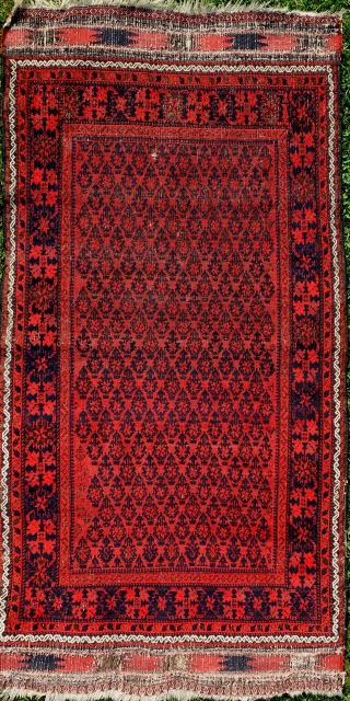 Persian Baluch, 178x92cm, 19th century, gently washed, glorious red, waiting to glow in your home.                  