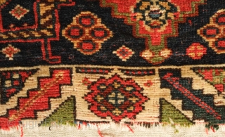 Qashqa'i saddle bag face, 19th century. Five to seven deeply saturated colors. Deep green in the central crab medallion with a slightly lighter shade in the top section.  More evident seen  ...