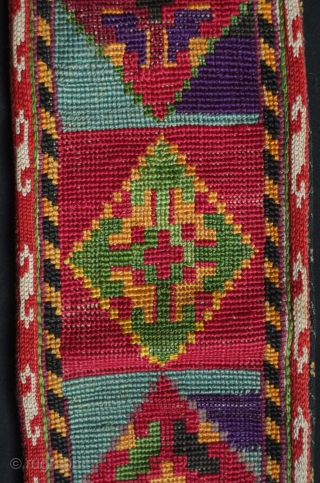 Uzbekistan Lakai silk cross stitch belt, 19th century. Great lively colors.  It even still has the silk knotted "buttons" on the bottom end.  11 x 87 cm    